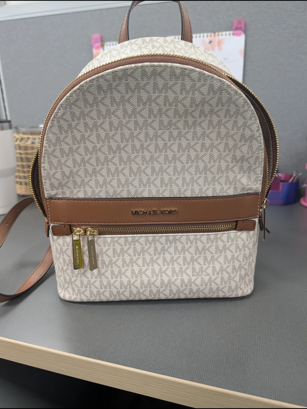 Michael Kors Cream Logo-Print Mini Backpack with Brown Trim
